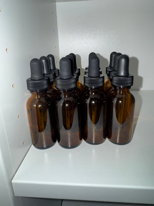 1 oz Amber Boston Round Bottles (w/ Dropper Tops) image 0